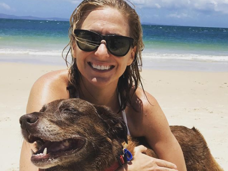 Person and dog on beach